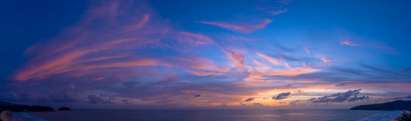 Fototapeta premium ..aerial panorama view reflection of sweet cloud on the wet sand beach. .Sea waves seamless loop on the wet Phuket sand beach. .Gradient color. Sky texture, abstract nature background