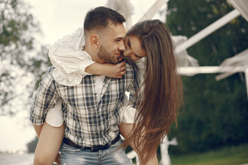 Obraz premium Beautiful couple spend time in a summer park