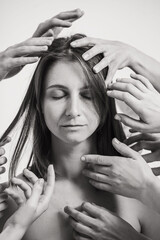 The impact of the environment on humans. A beautiful curly woman looks into the frame. Lots of...
