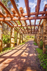 Beautiful arbor or  shaded walkway at Araluen Botanic Park , Perth Western Australia .