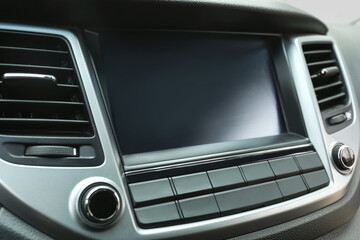 Obraz na płótnie Canvas Modern radio on dashboard of car, closeup