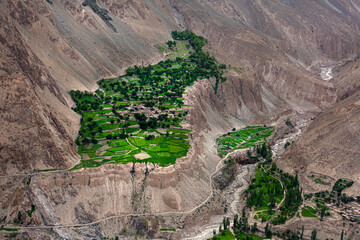 an aerial view of beautiful village in the mountains, landscape photography of baltoro reign in...