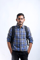 Fototapeta premium Young indian college student with bag pack on white background.