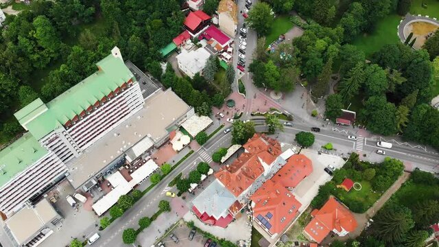 Aerial view revealing Sinaia city. Bucegi Mountains, Carpathian Mountains,  Romania.