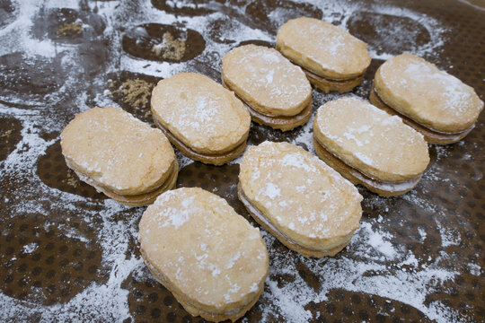 Dacquoise French pronunciation is a dessert cake made with layers of almond.