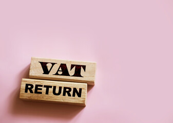 VAT return text Value Added Tax return on wooden blocks. Financial concept