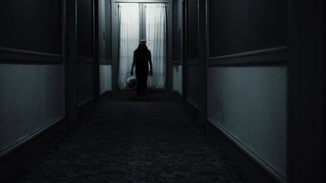 Eerie Horror Scene of a Possessed Girl In A Hotel Corridor