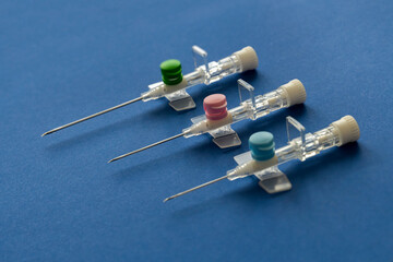 Peripheral venous catheters placed on the therapy trolley in the infirmary - obrazy, fototapety, plakaty