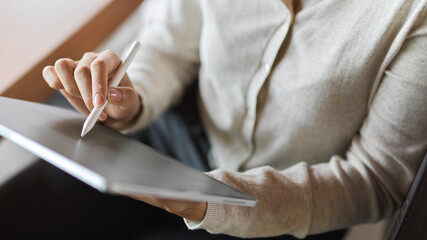 Businesswoman working on tablet