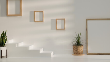 Minimal copy space design with picture frames, plants, white wall and white stairs