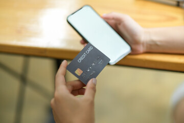 Mobile phone empty screen mock up with hold credit card, Online payment