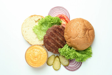 Concept of cooking burger on white background, top view