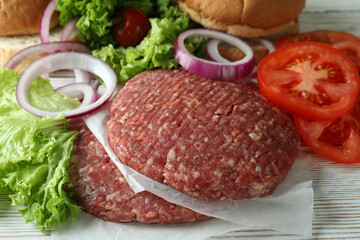 Concept of cooking burger with burger ingredients, closeup