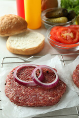 Concept of cooking burger with burger ingredients, closeup
