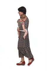  mother carrying her baby walking on white background