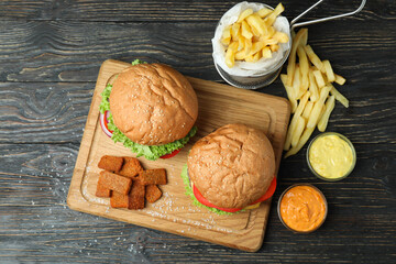 Concept of fast food on rustic wooden table