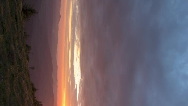 Beautiful sunrise in the Ukrainian carpathians in summer, timelapse vertical video