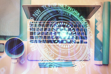 Multi exposure of data theme drawing hologram over topview work desk background with computer. Concept of technology.