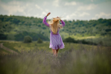 Portrait of smiling blonde woman on the lavender field