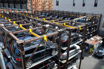 Innovative city parking system with Cars stacked in a multi-level parking lot in Manhattan, New...