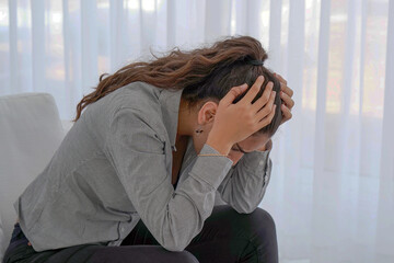Close up portrait of a sad ill woman. Woman worried about the future. Portrait of a sad woman