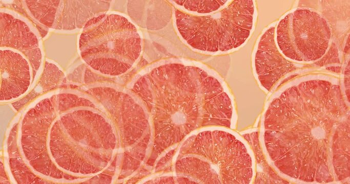 Grapefruit slices closeup, food summer background, fruits top view animation loop video