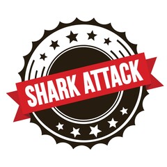 SHARK ATTACK text on red brown ribbon stamp.