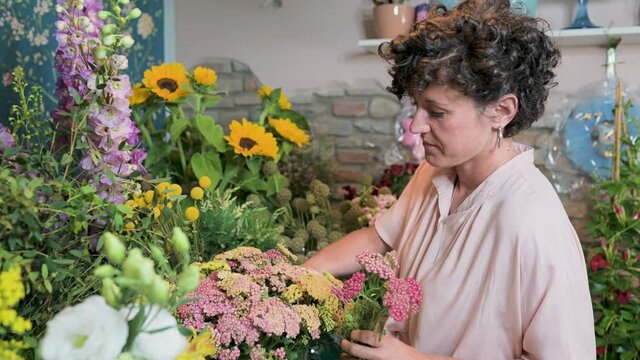 Florist working in flower shop