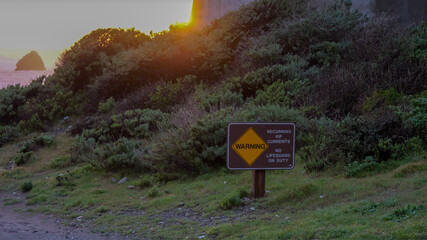 warning sign at a beach in Big Sur 