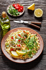 cod with bulgur, steamed green beans, top view