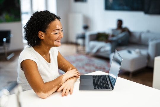 Attractive middle aged woman using laptop computer Stock Photo | Adobe Stock