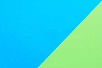 Blue and green two-tone paper background. Colored paper pattern.