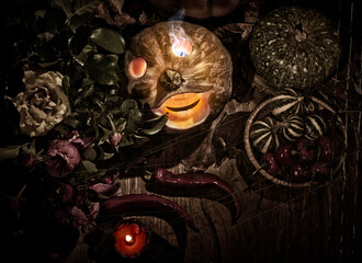 Obraz na płótnie Canvas Halloween Pumpkins And Candles On Wooden