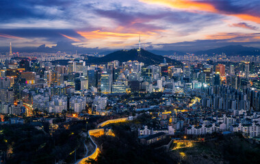 Fototapeta premium Cityscap of N seoul tower and seoul city from top of mountain