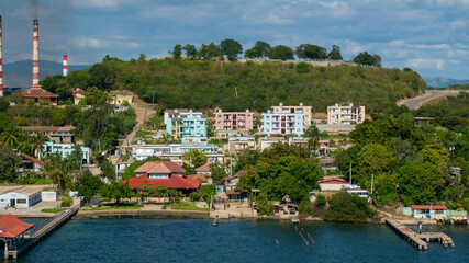 Colorful buildings and villas on the coast line of Santiago de Cuba, Cuba