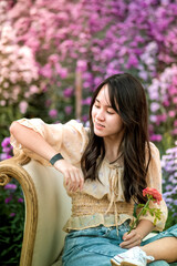 Teenager in a beautiful Margaret flower field,