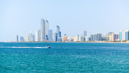 Abu Dhabi skyline on a sunny summer day, skyscrapers