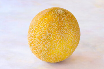 Melon on a white wooden background