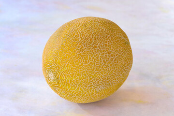 Melon on a white wooden background