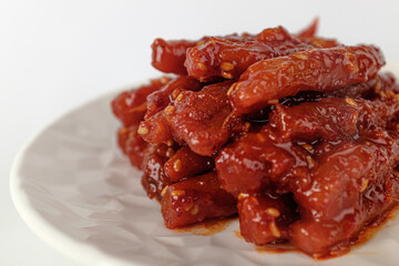pickled deodeok on a white background