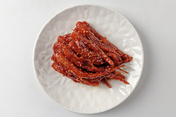 pickled deodeok on a white background