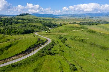 Fototapeta na wymiar Above view of countryside road, aerial view