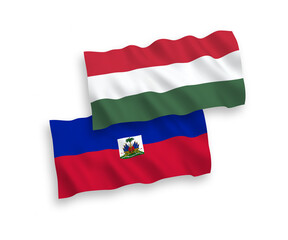 Flags of Republic of Haiti and Hungary on a white background