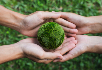 Earth Day. Hands adult Teamwork harmony Holding earth on hands. Environmental and reduce global warming help earth, top view. ecology and environment sustainable concept..