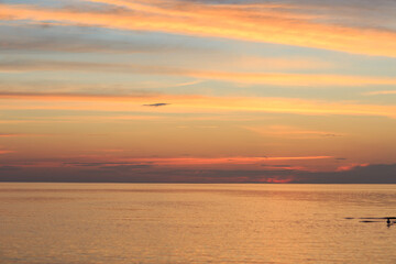 orange sunset in the evening on the sea
