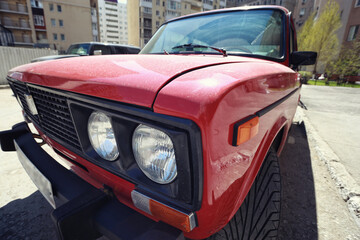 headlight of a red vintage car