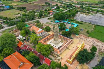 Fototapeta premium Wat Aranyikawas temple, reclining buddha and pagoda, in Chon Buri, Thailand