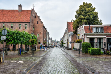 Beautiful views of Elburg's old town, the Agnieten monastery and the Vischpoort, a medieval defensive tower. Netherlands, Holland, Europe