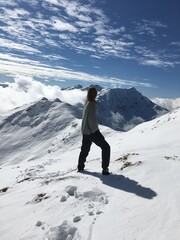 girl on the top of the mountain