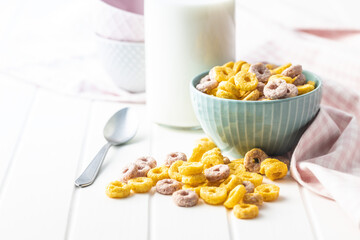 Colorful cereal rings in bowl.